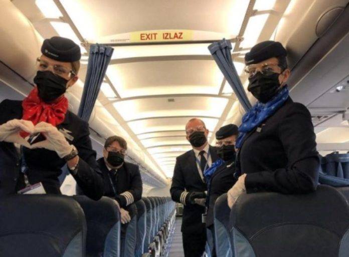 Zastitne maske na avionu Air Serbia