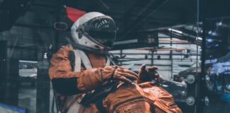 man wearing brown astronaut suit