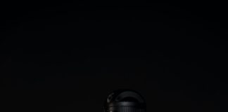black and gray adidas spray bottle