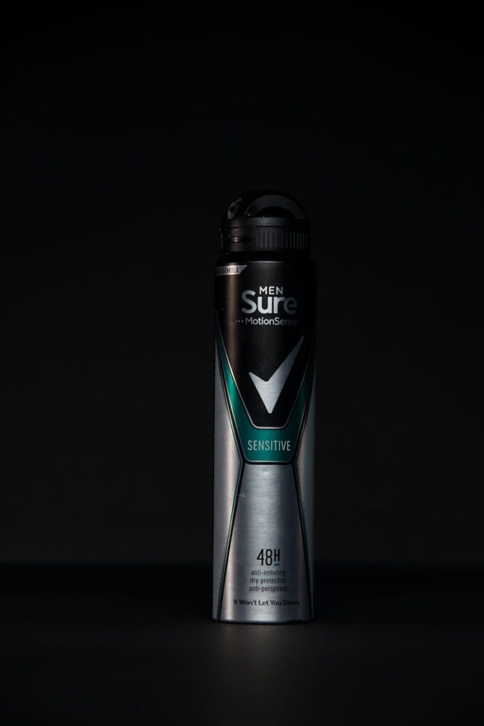 black and gray adidas spray bottle