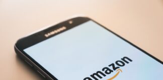 black Samsung Galaxy smartphone displaying Amazon logo