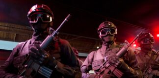 men with assault rifles
