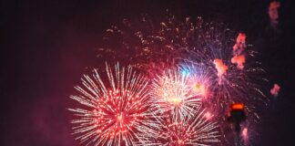 selective focus photography of fireworks display at night