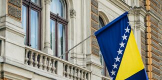 blue and yellow flag near door