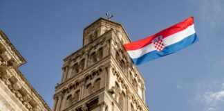 white concrete building under blue sky during daytime