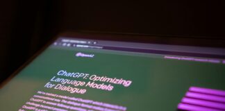 a close up of a computer screen with a blurry background