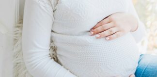 woman in white long sleeve shirt
