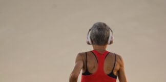 a boy walking on a beach