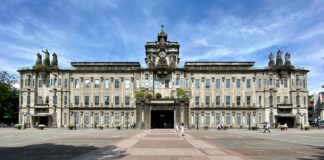 white concrete building under blue sky during daytime