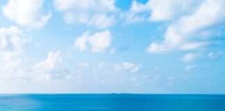 blue sea under blue sky during daytime