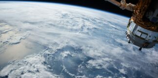 view of Earth and satellite