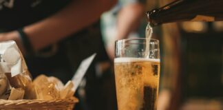 clear drinking glass with beer