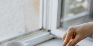 person holding black frying pan