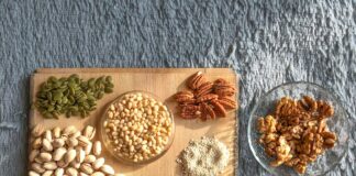brown and white nuts on white ceramic bowls
