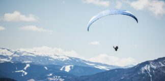person doing xtreme sports parachute