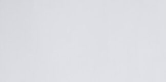 red lipstick on white surface