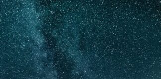 brown house under stary night