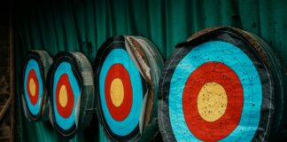 a group of arrows that are on a wall