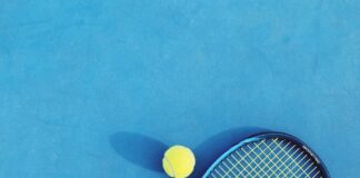 white and blue tennis racket