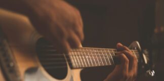 person playing guitar