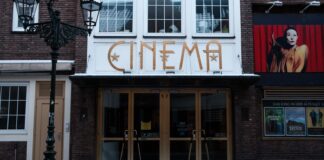 brown wooden door with glass panel