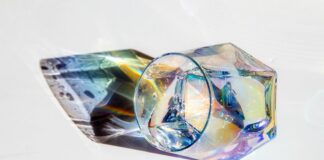 clear drinking glass with blue liquid