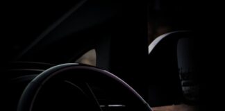 black and silver mercedes benz steering wheel