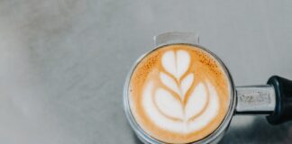 flat lay photography of coffee latte, ground coffee, and coffee beans