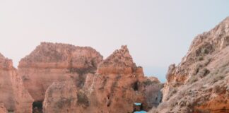 three boats on body of water