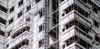 a building under construction with scaffolding around it