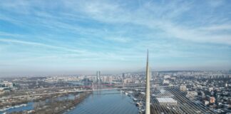 an aerial view of a bridge over a river