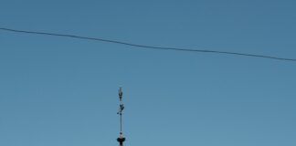 a building with a clock on the top of it