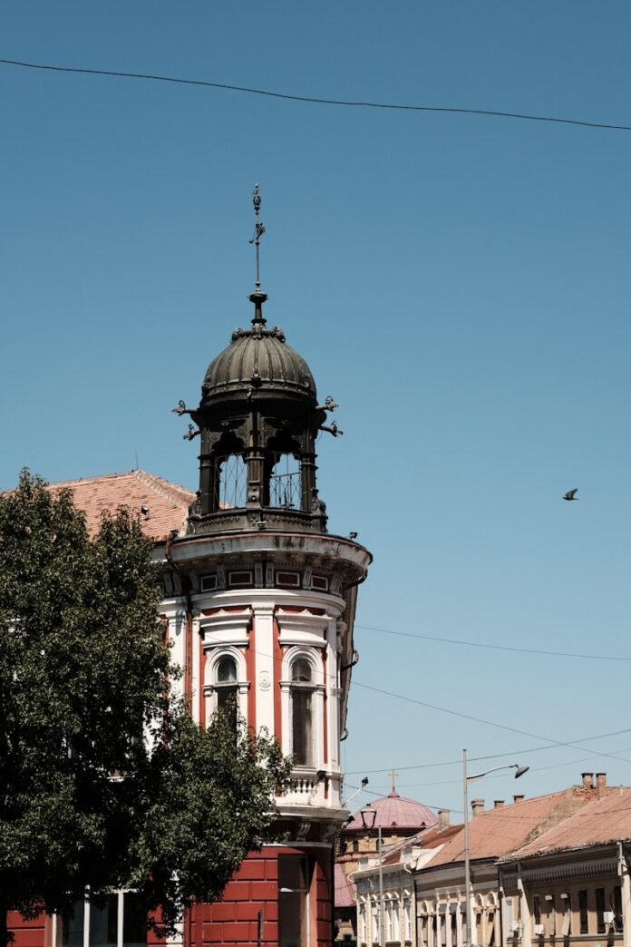 a building with a clock on the top of it