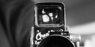 a black and white photo of a camera