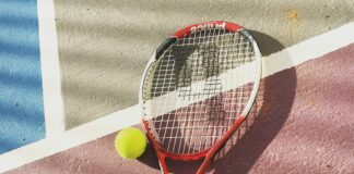 yellow and white tennis racket
