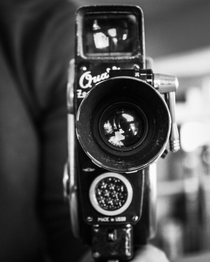 a black and white photo of a camera