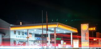 white and red store front during night time