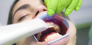 boy with green and white pacifier
