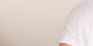 a doctor checking the blood pressure of a patient