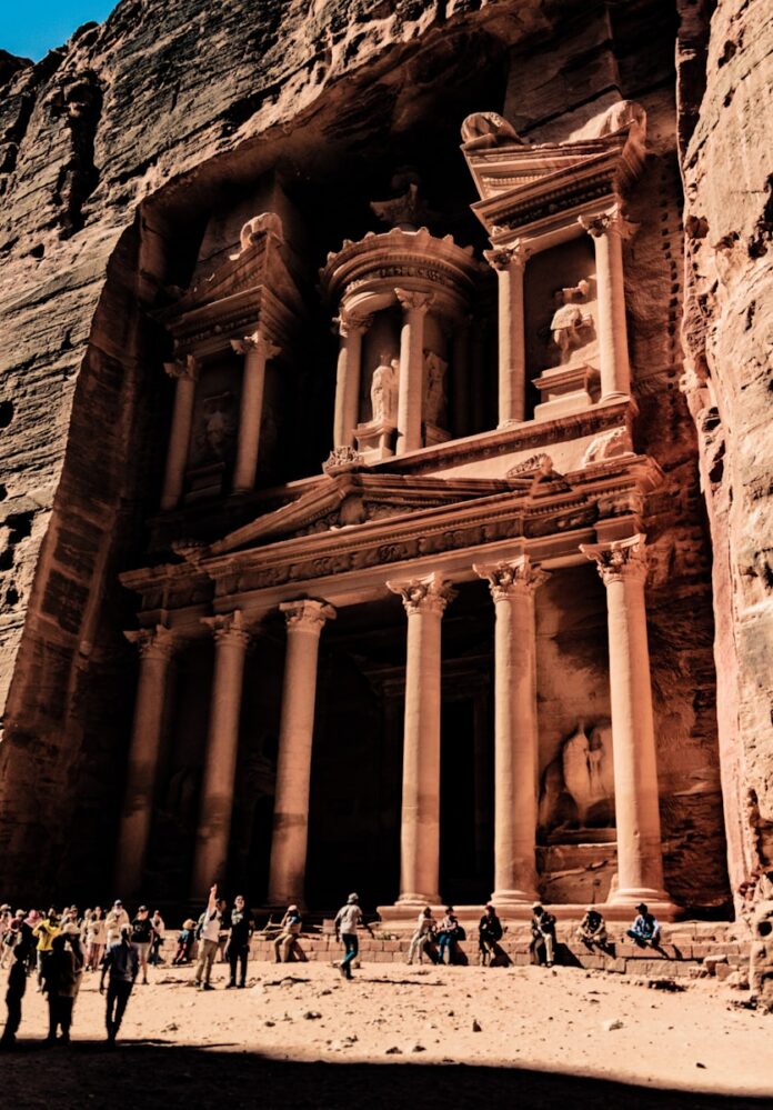 a group of people standing in front of a building
