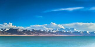 mountain near on body of water photography