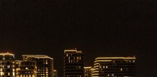 a view of a city at night from across the water