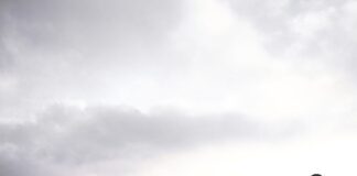 a person standing on top of a rocky hill