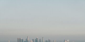 a view of a city from the top of a hill