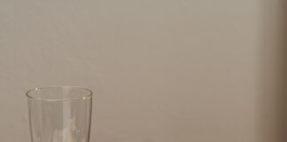 a group of glasses with liquid in them