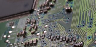 close-up photography of green motherboard