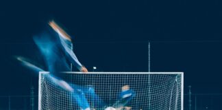 timelapse photo of soccer player kicking ball