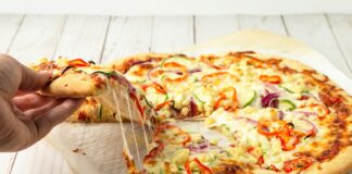 pizza on brown wooden table