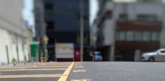 worm's-eye view of gray parking lot