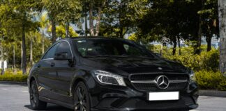 a black car parked in a parking lot